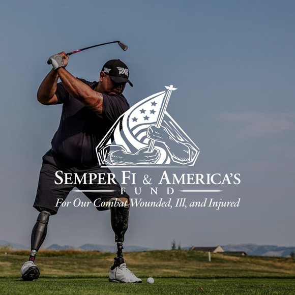 Prosthetic legs swinging a golf club with the Semper Fi & America’s Fund Logo