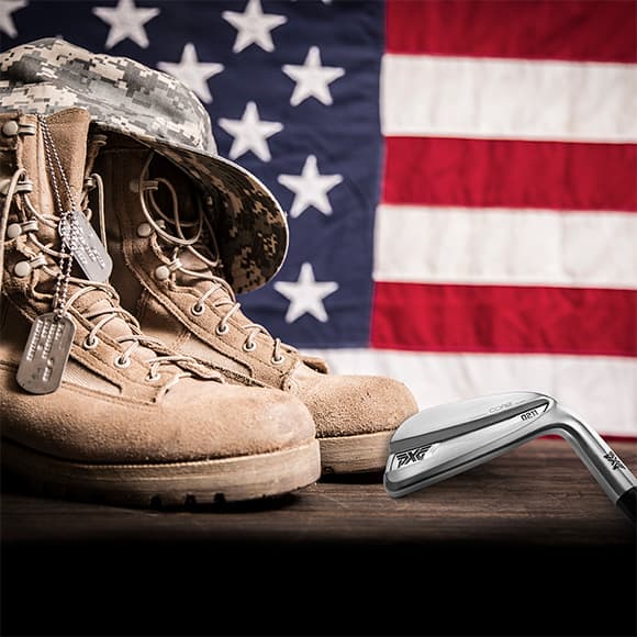 Military boots in front of American flag.