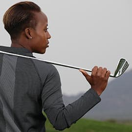 Sadena Parks holding golf club