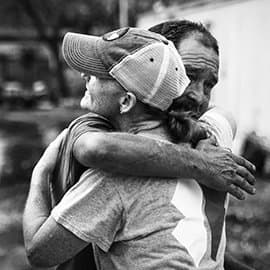 Man Hugging Woman During Hurricane Harvey
