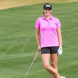 Gerina Piller on posing with a golf club on a golf course